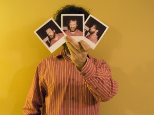 Self portrait with polaroids